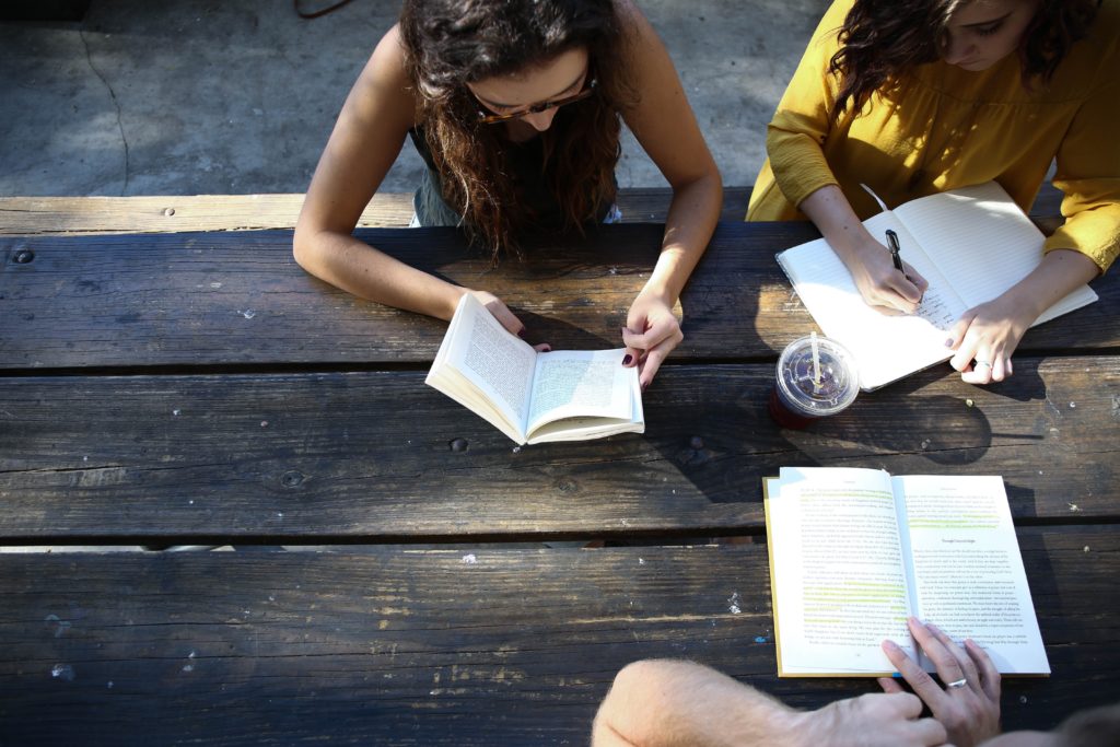 Students studying around a table