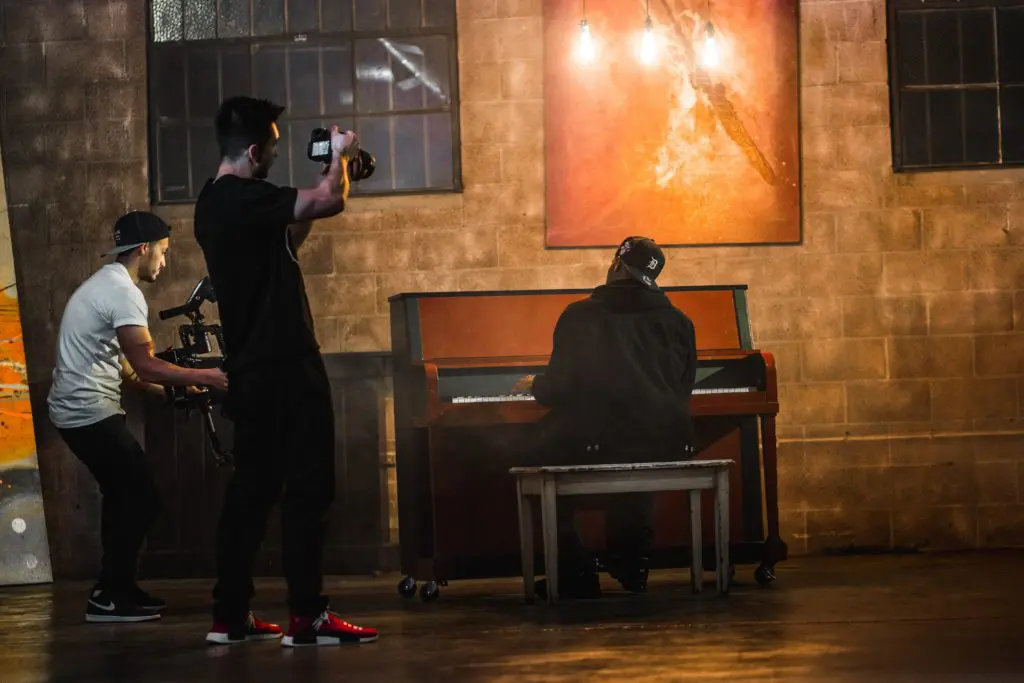 Photo session in front of an old piano. 