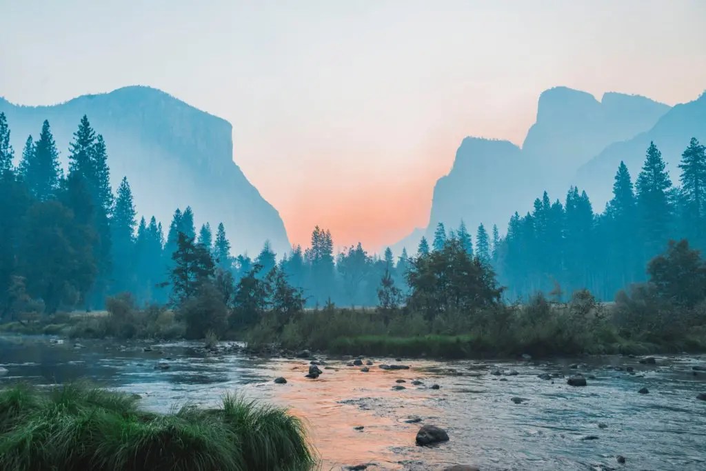 Misty mountain landscape with river