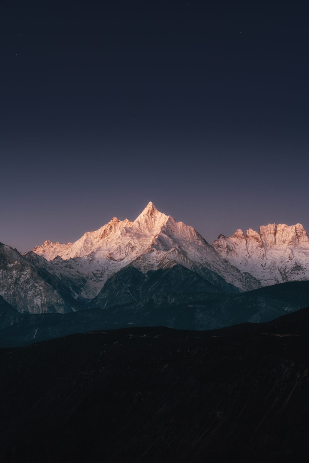 snow covered mountain during daytime