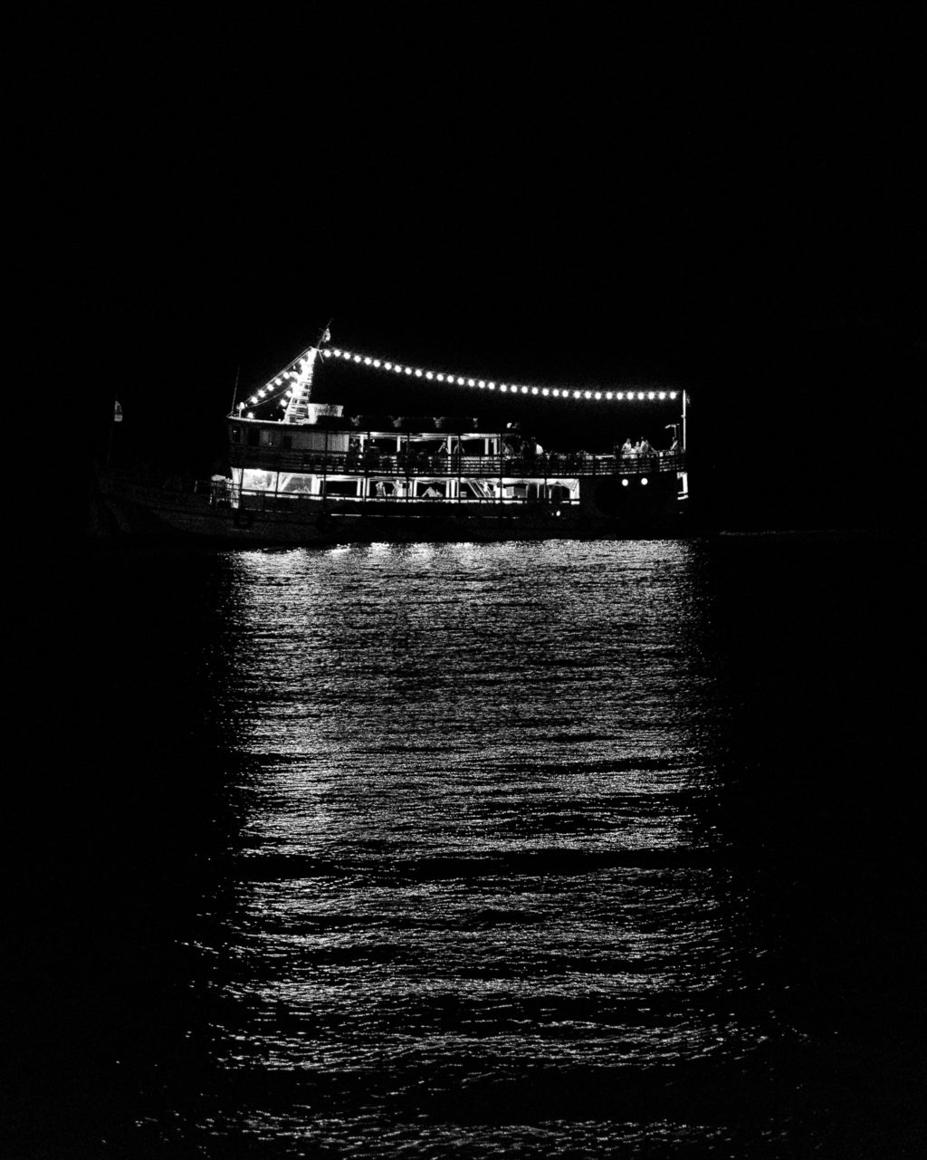 River with boat in black and white 