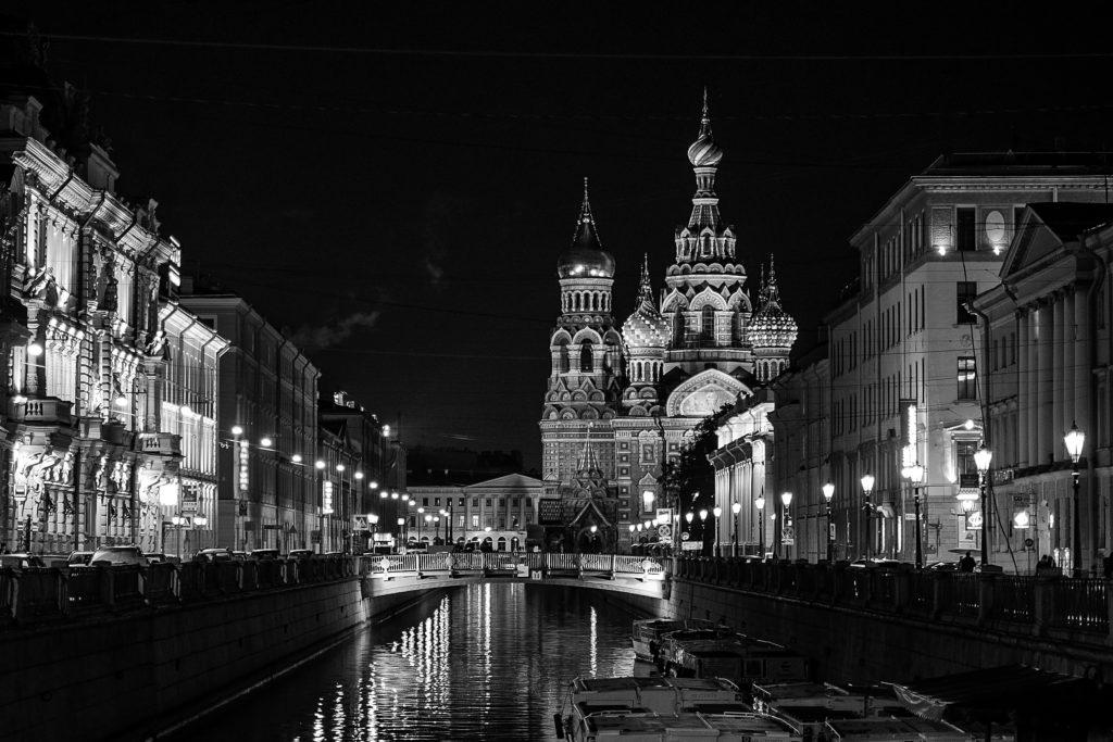 River with city in black and white 