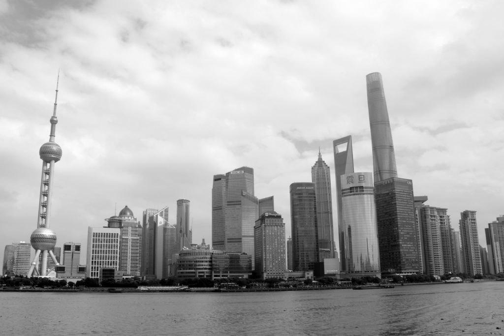 River with city skyline in black and white