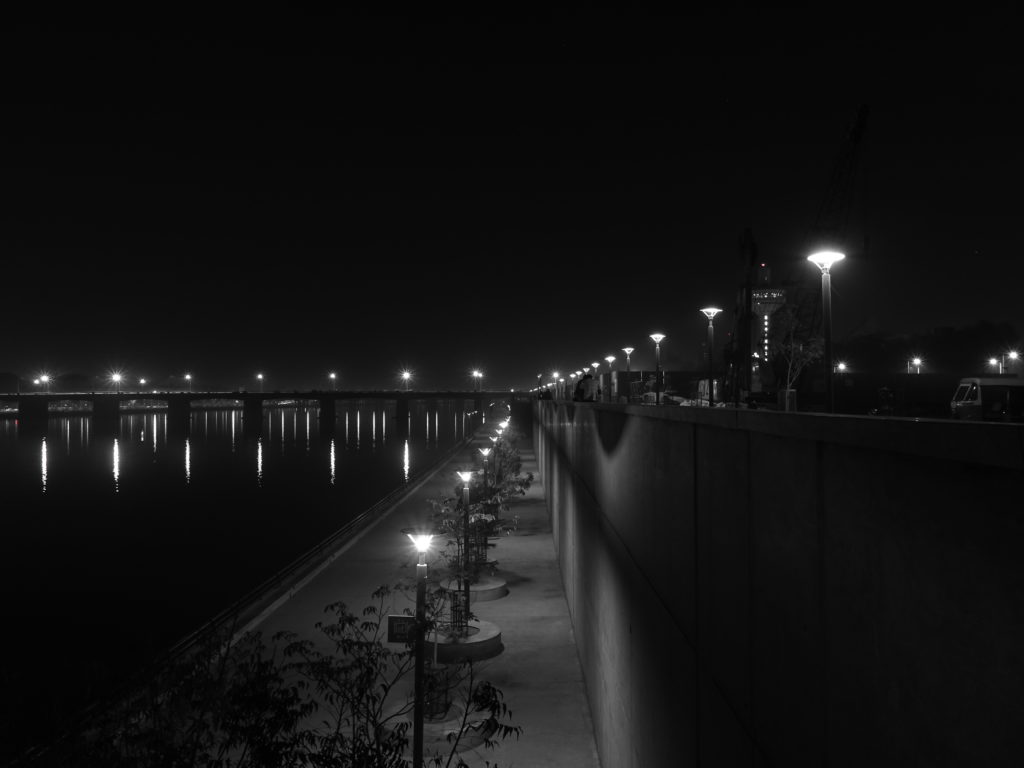 River and city in black and white 