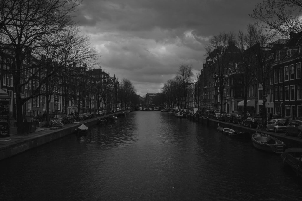 River and buildings in black and white 