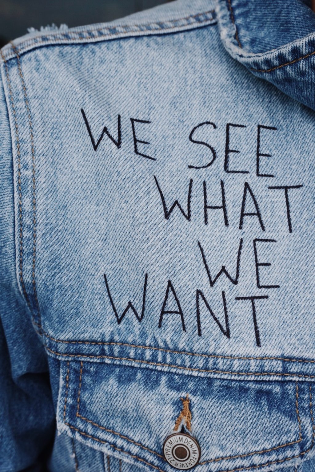 blue denim collared top with we see what we want text