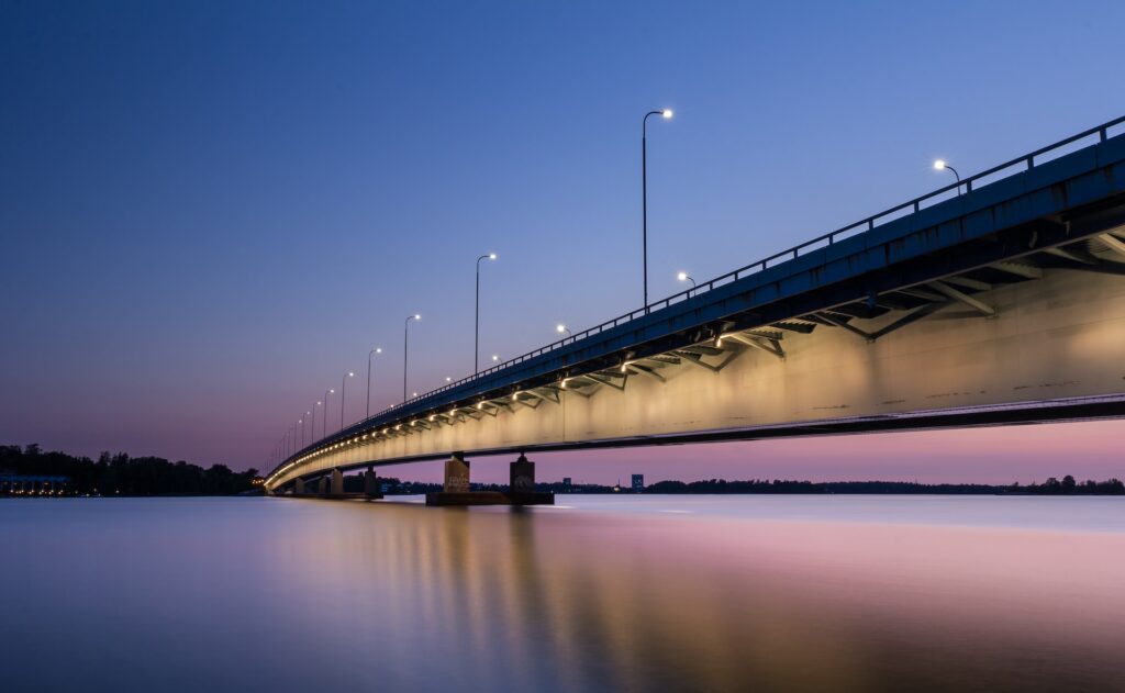 quiet evening bridge reflections in the river