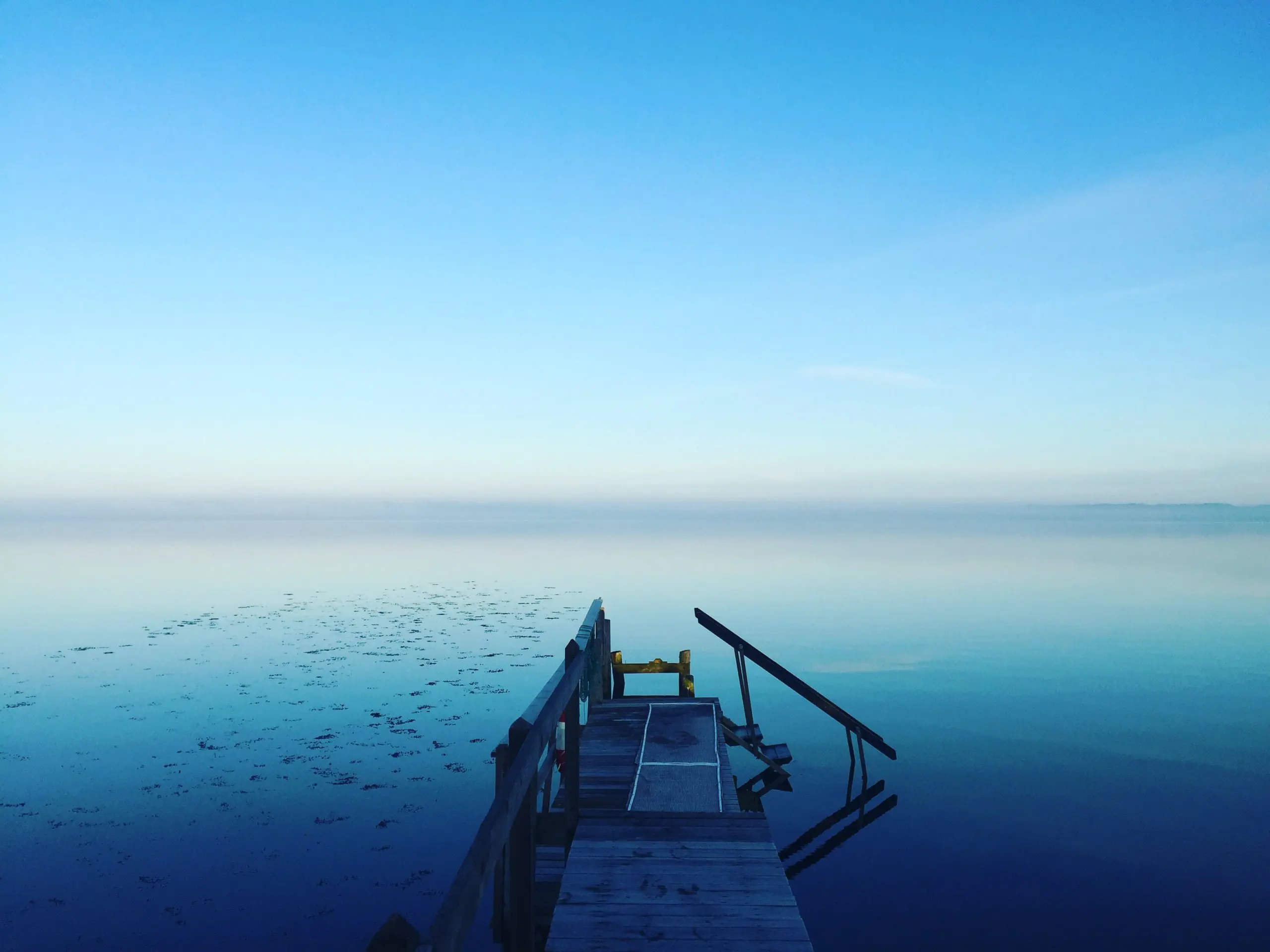 photography of calm body of water