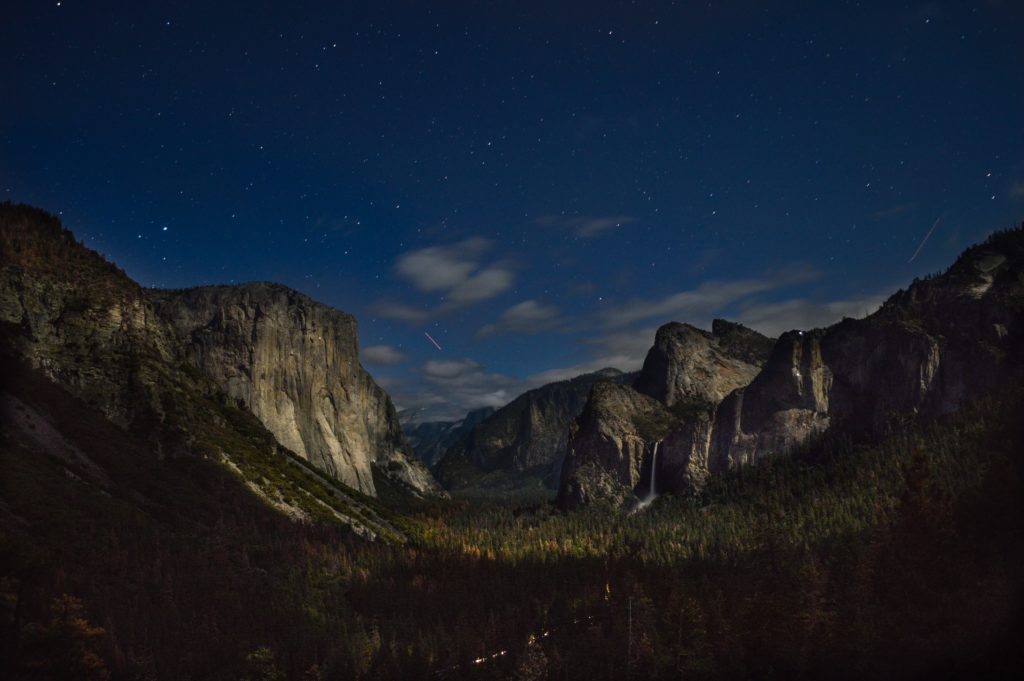 Twilight and stars in a mountain landscape