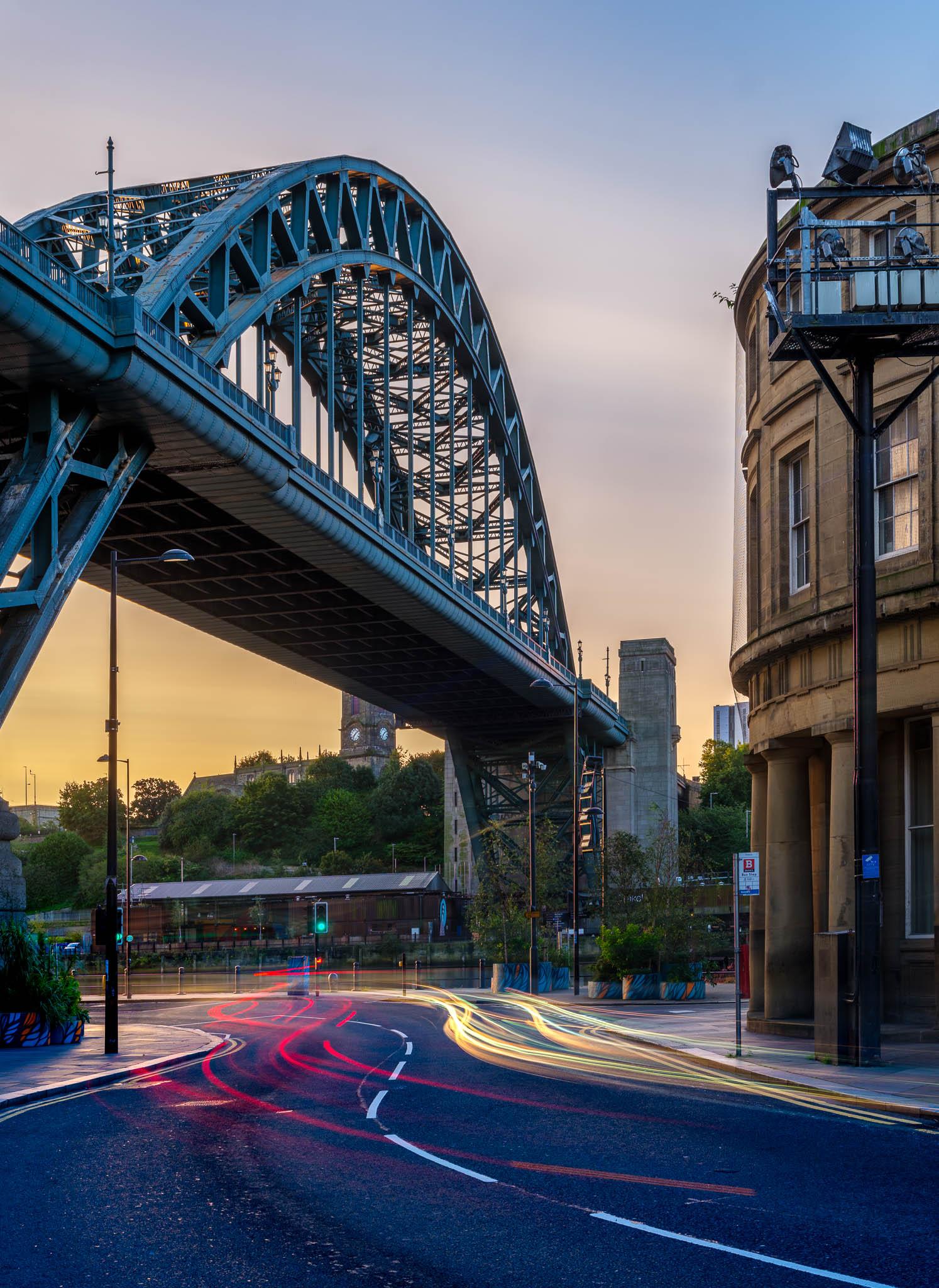 Car light trails under the Tyne Bridge in Newcastle during morning blue hour 