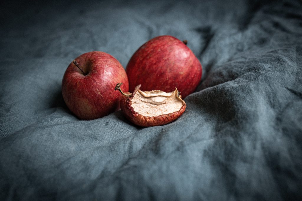 wrinkled red apple