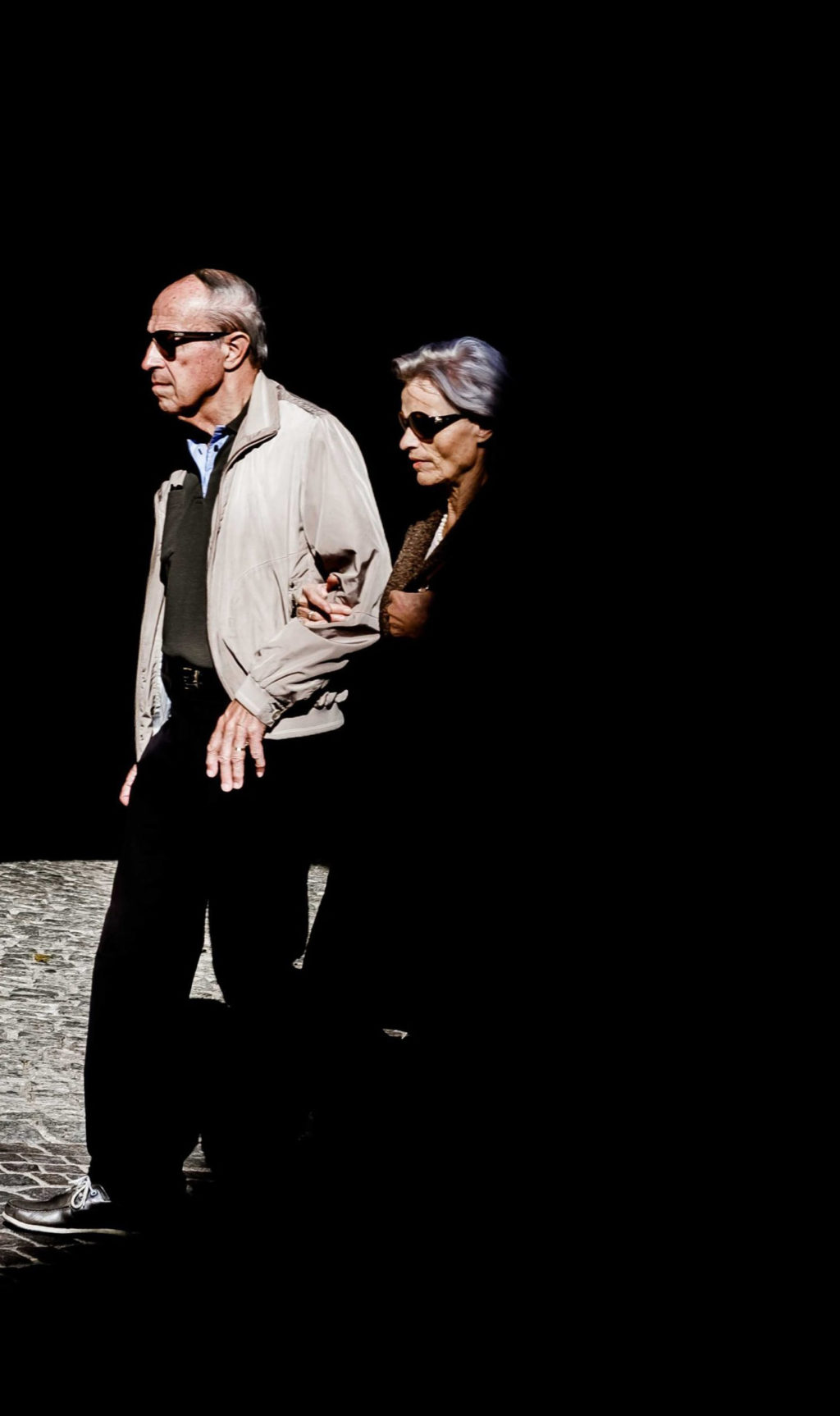 old couple dark background