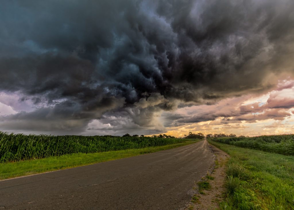 Stormy skies over a flat landscape. 