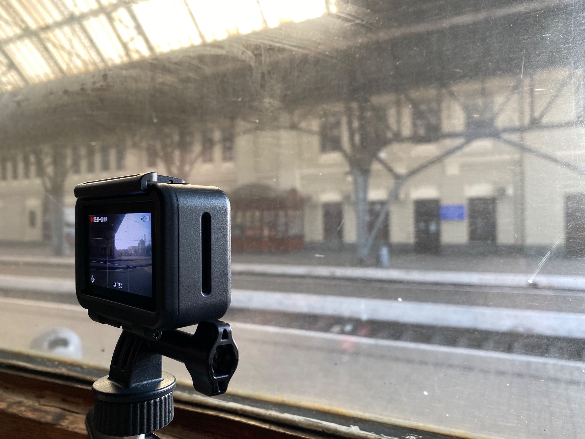 DJI Osmo Action camera in a train window 