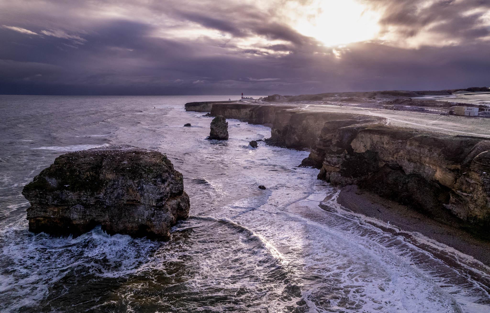 Drone shot of Marsden Rock in North East England taken on a winter morning 