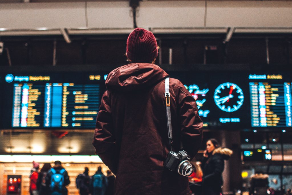 travel photographer in airport