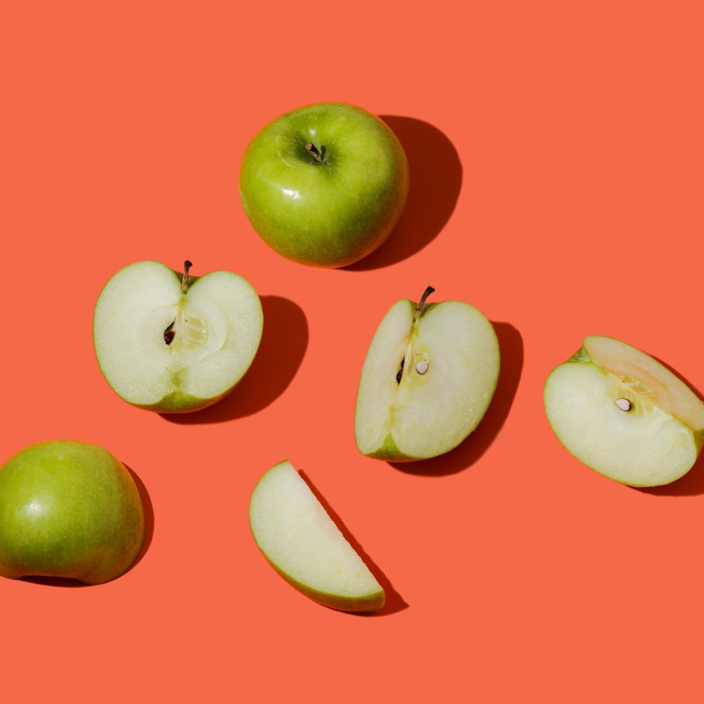 apples pink background