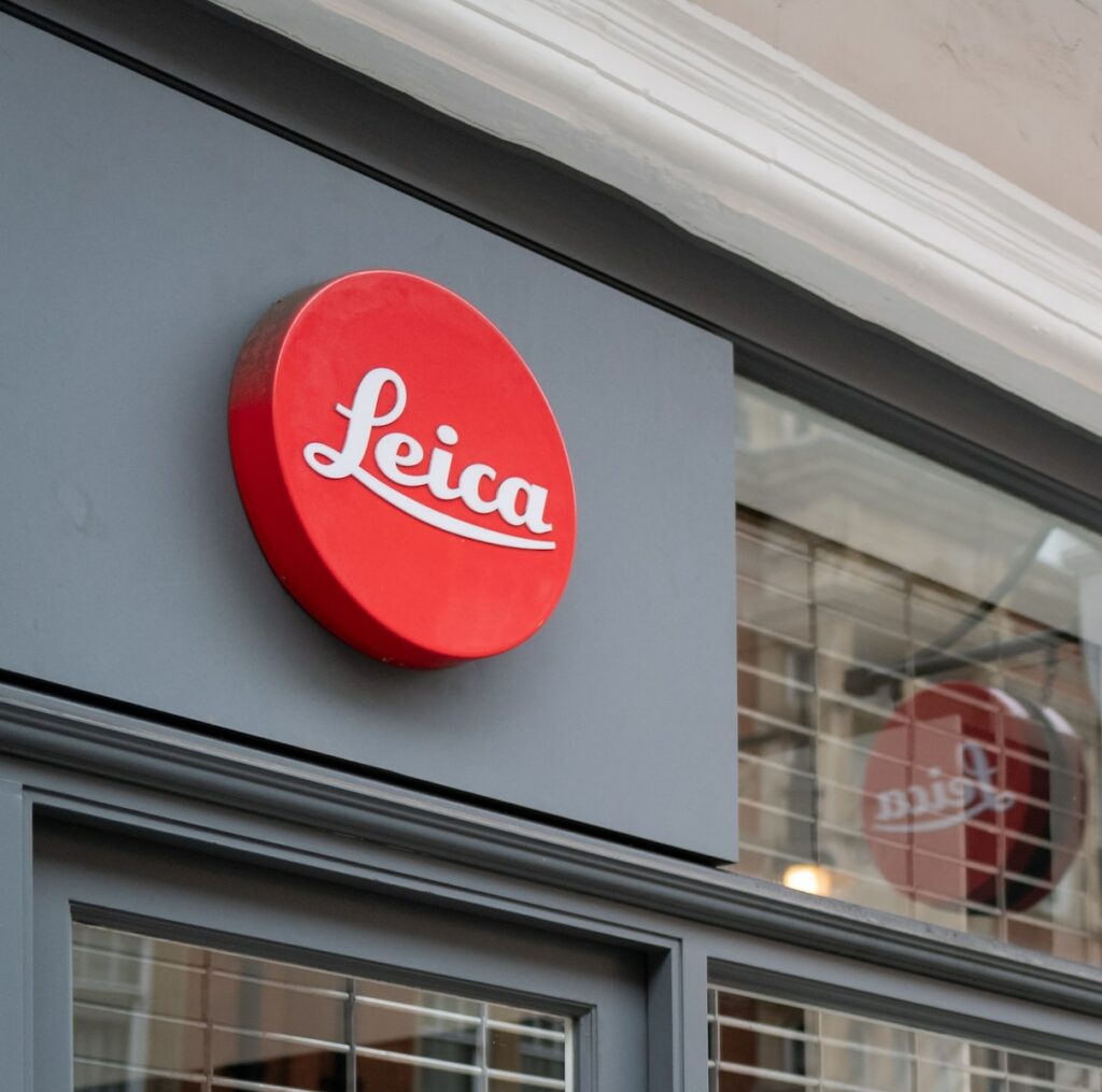 red and white Leica signage