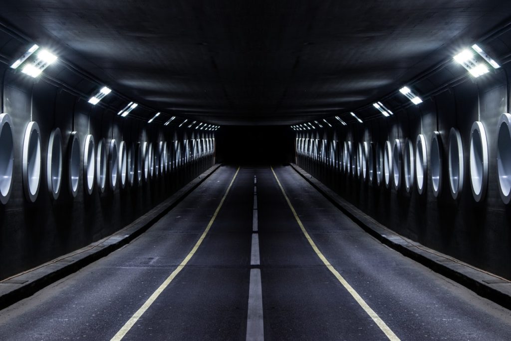 gray paved road tunnel