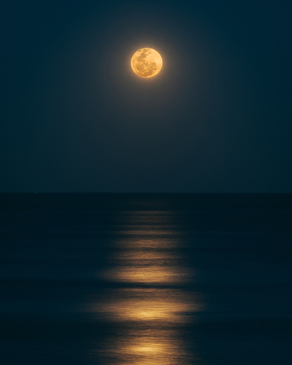 full moon over water