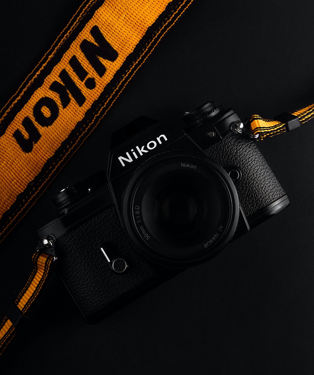 black Nikon body camera