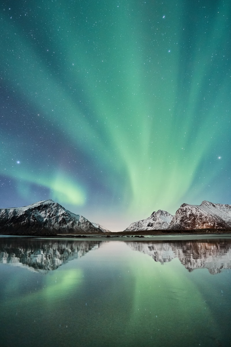 landscape photo of mountains near lake wallpaper