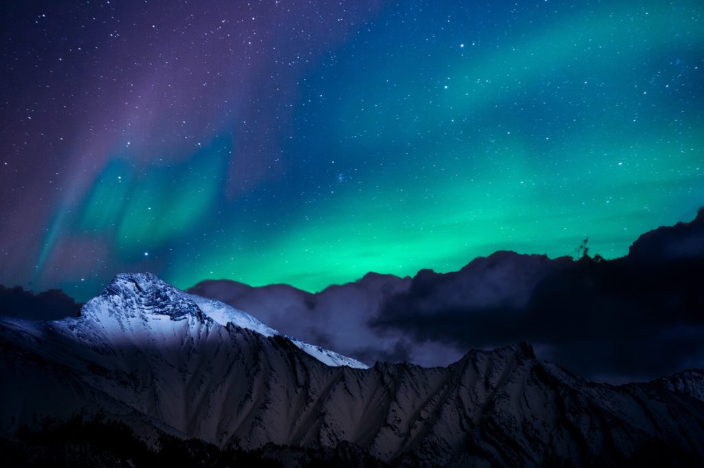 landscape photo of mountain with polar lights