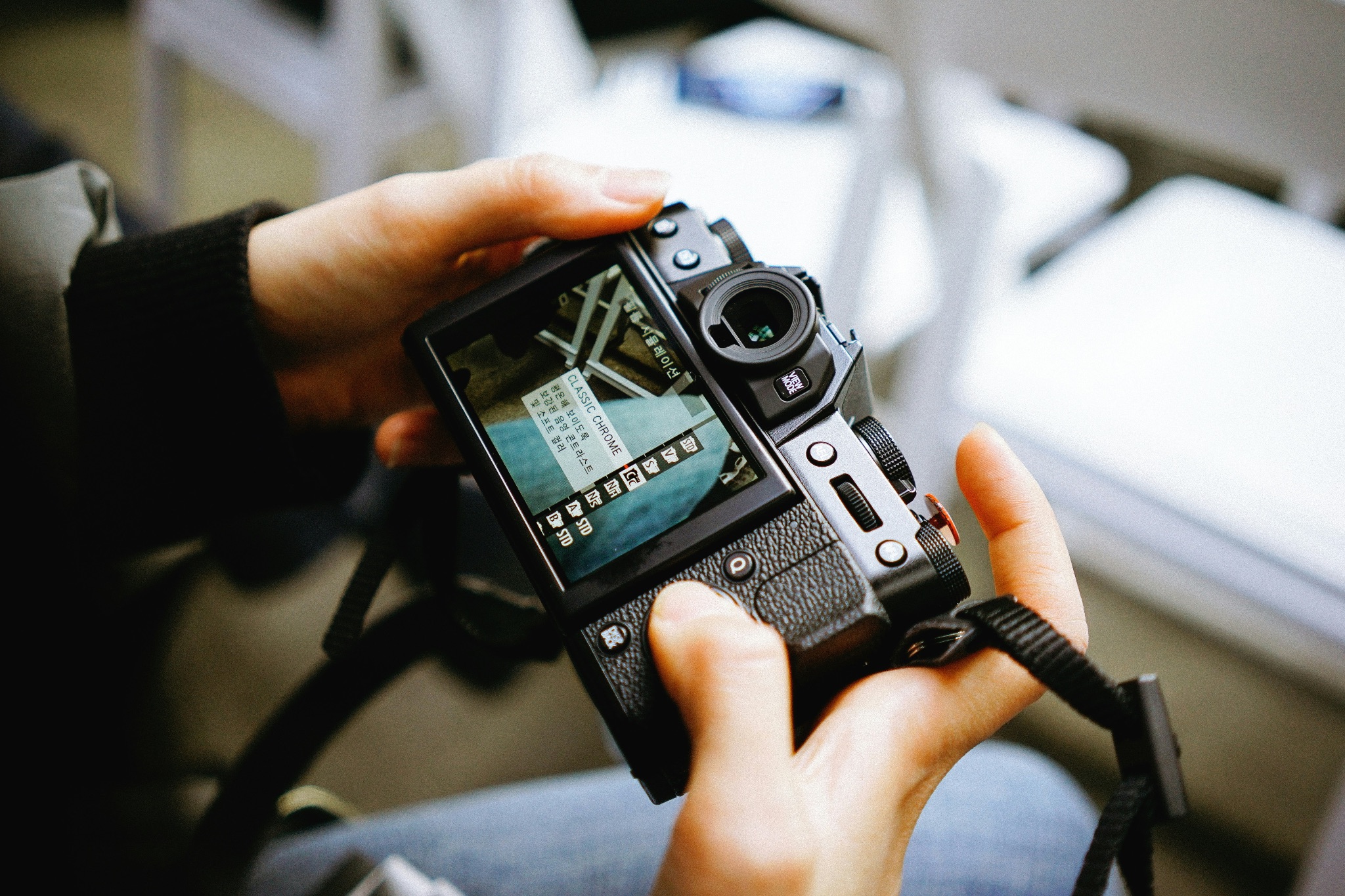 LCD screen and menu of a modern mirrorless camera 