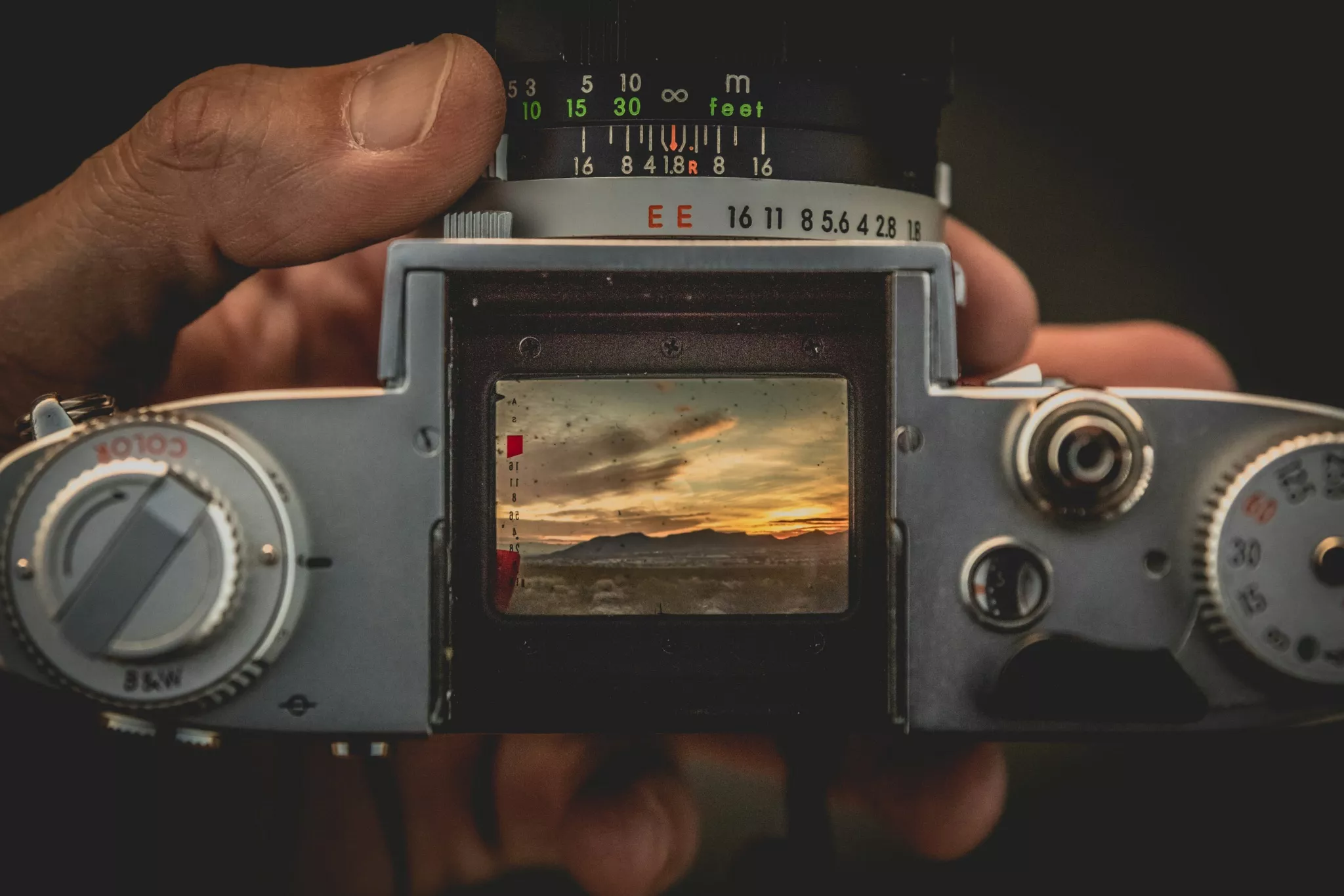 Looking straight down onto the viewfinder of a film camera
