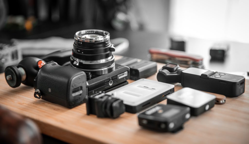 Camera gear and accessories on a table