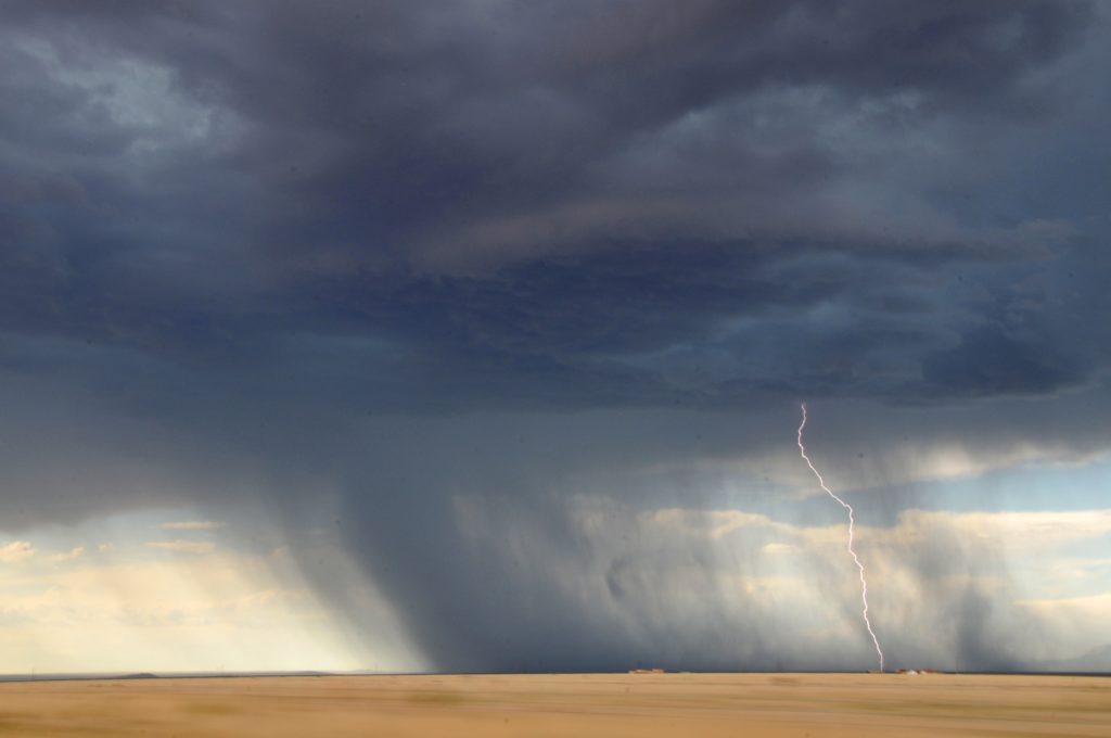 Desert storm with lightning.