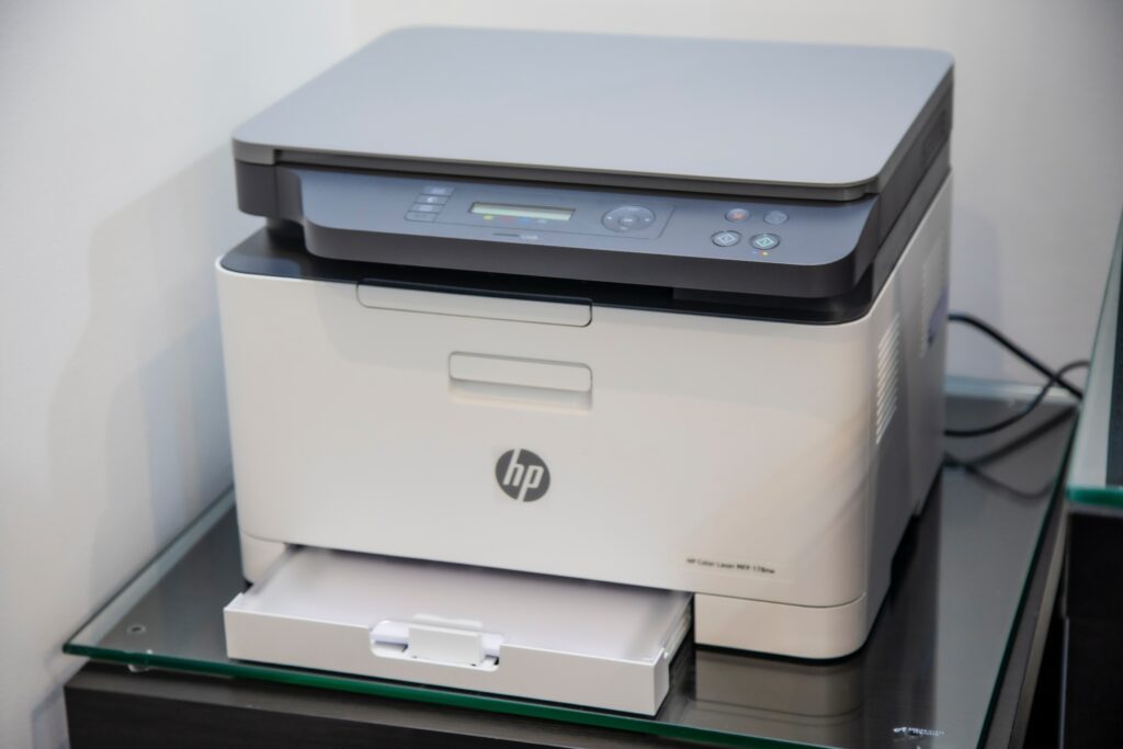 Flatbed scanner and printer on desk