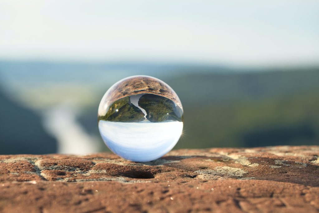 lens ball with landscape behind