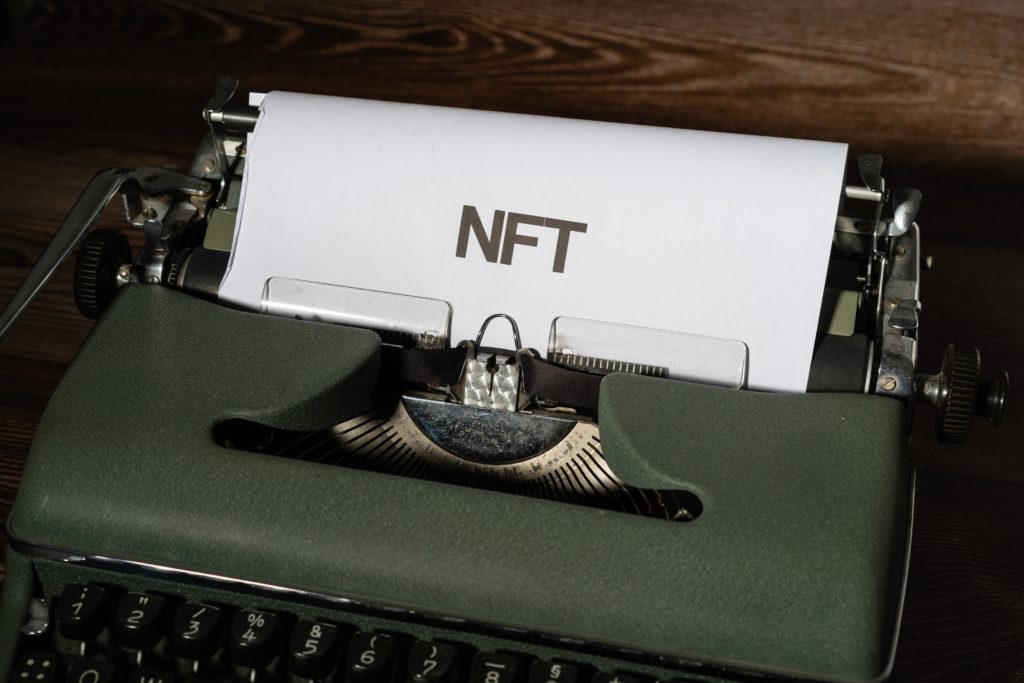 Typewriter with the word NFT