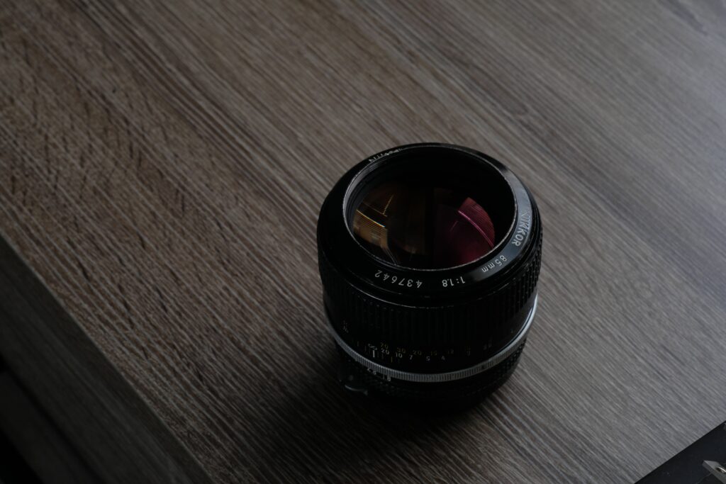 An 85mm portrait lens on a desktop
