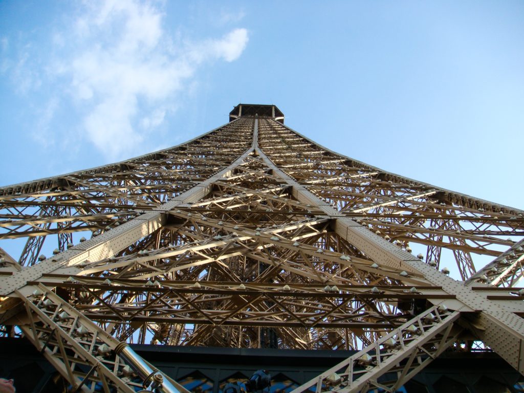 low angle photo of grey and brown metal tower
