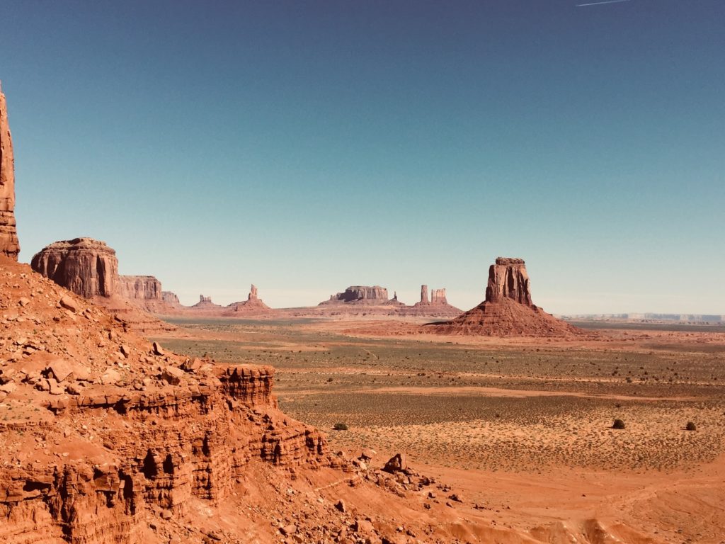 brown rock formation under blue sky during daytime