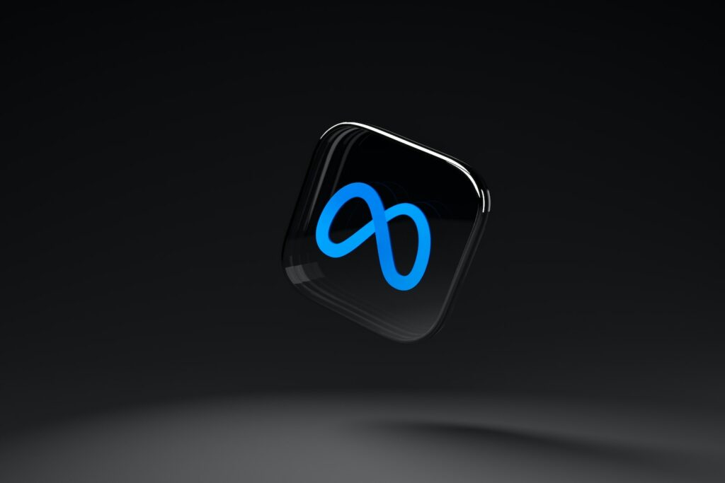 a black square with a blue meta logo on it