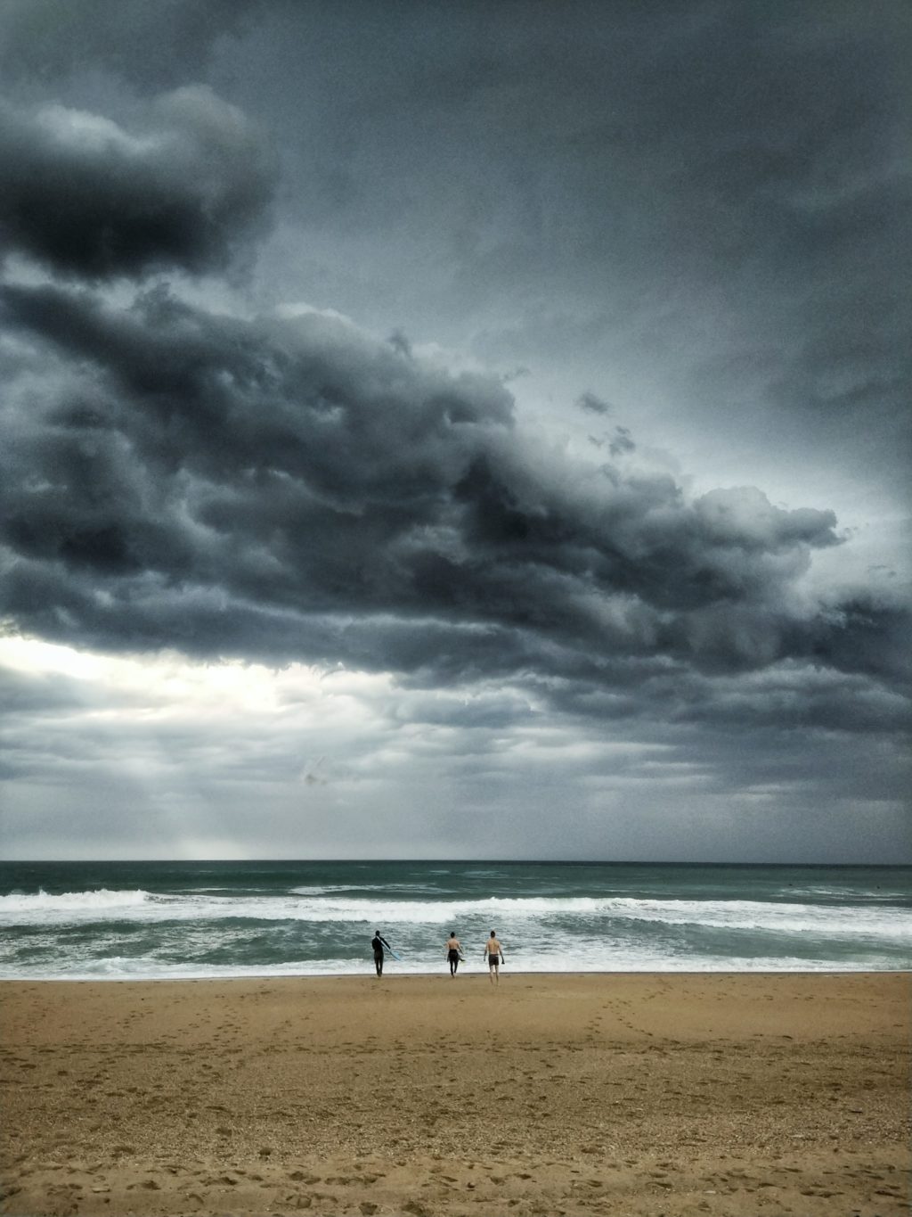 dramatic sky over beach