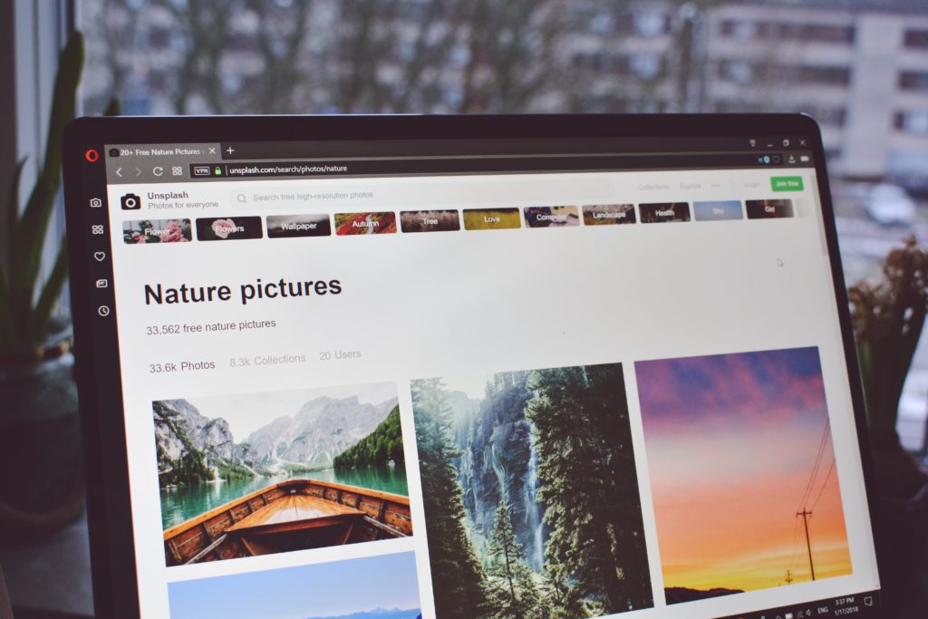 Laptop showing stock photos