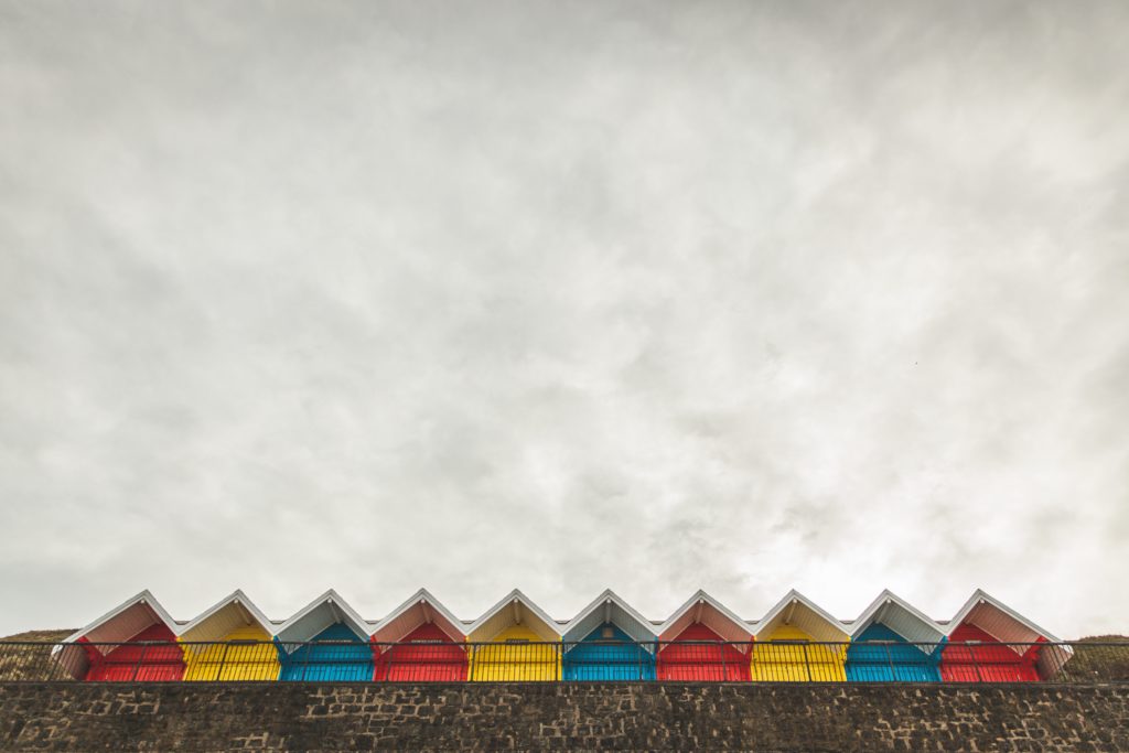 Colorful beach huts mid-winter photography