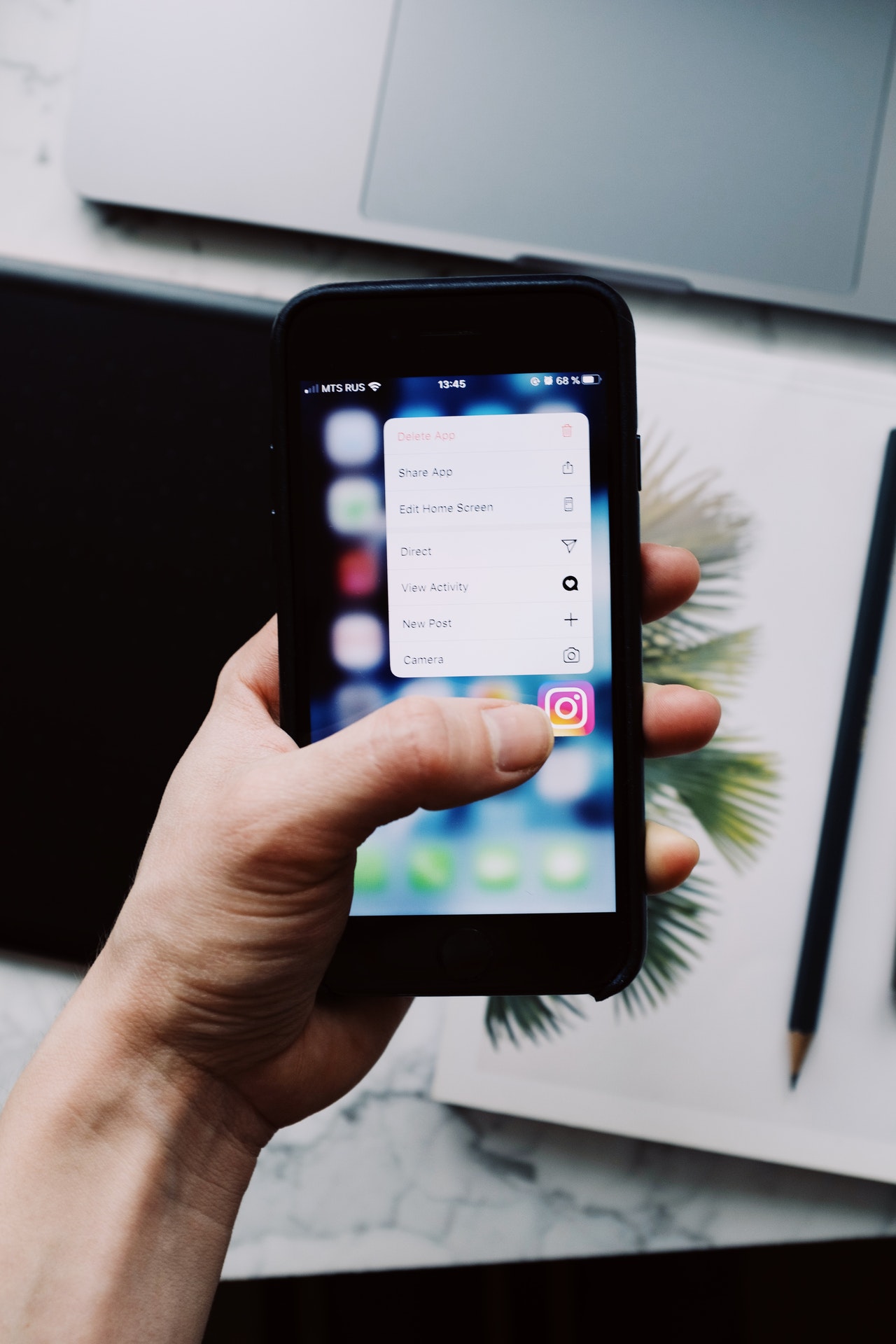 person holding black smartphone