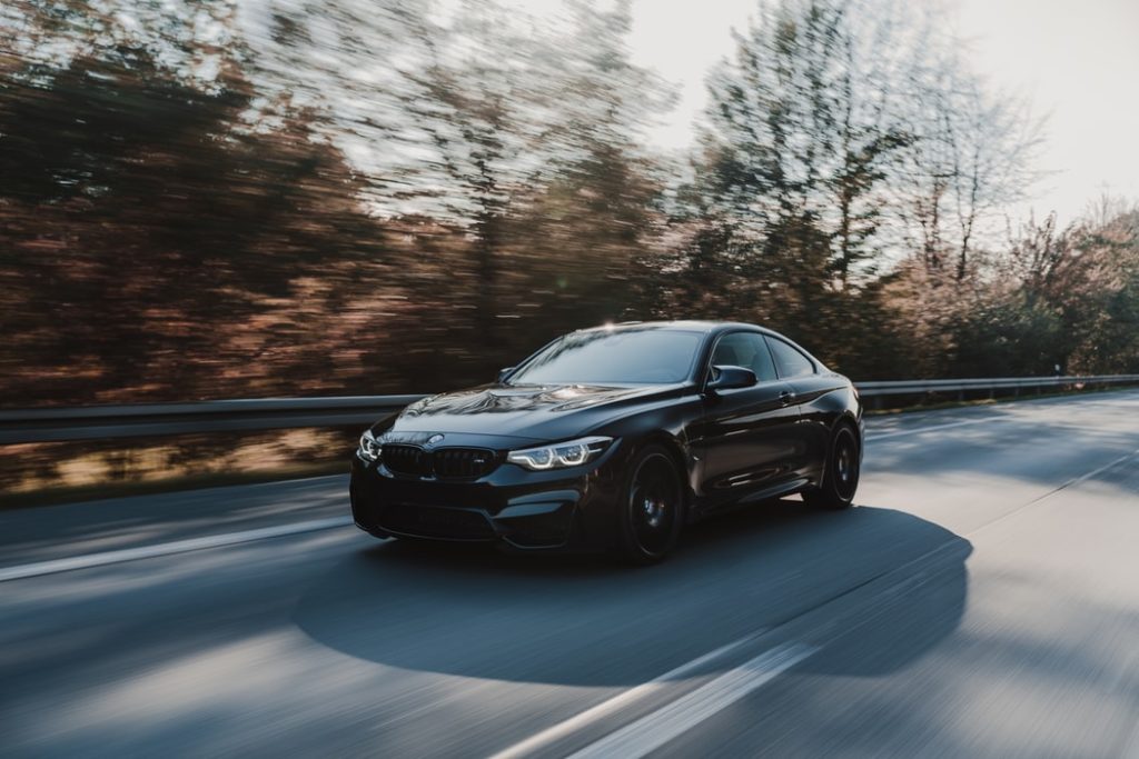 a black car on a road