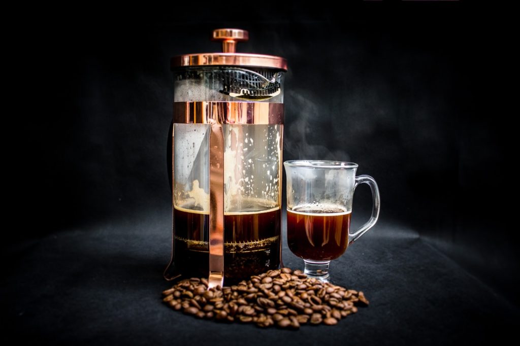 photo of coffee warmer pump jar filled with coffee