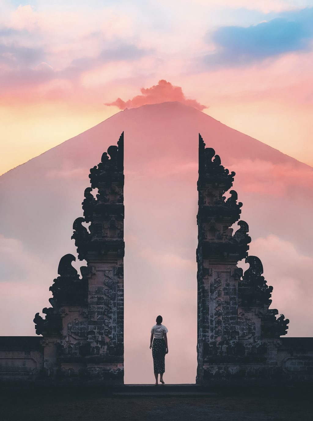 photo of person standing on temple