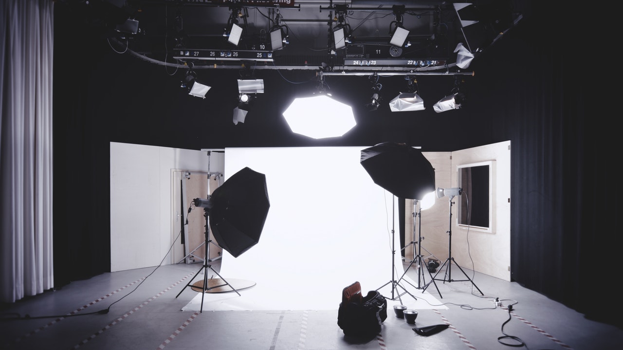 photo studio with white wooden framed wall mirror