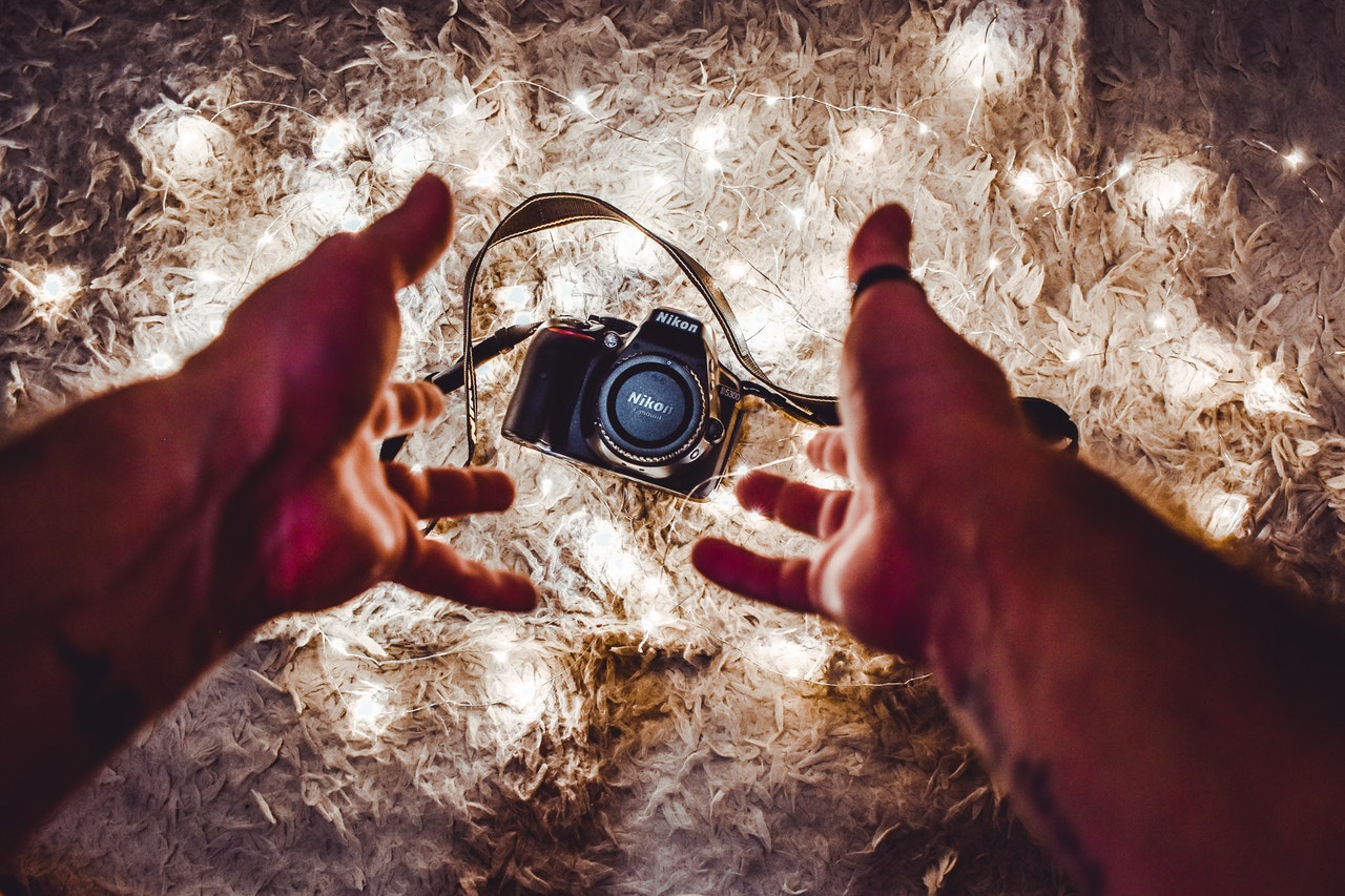 red and black dslr camera