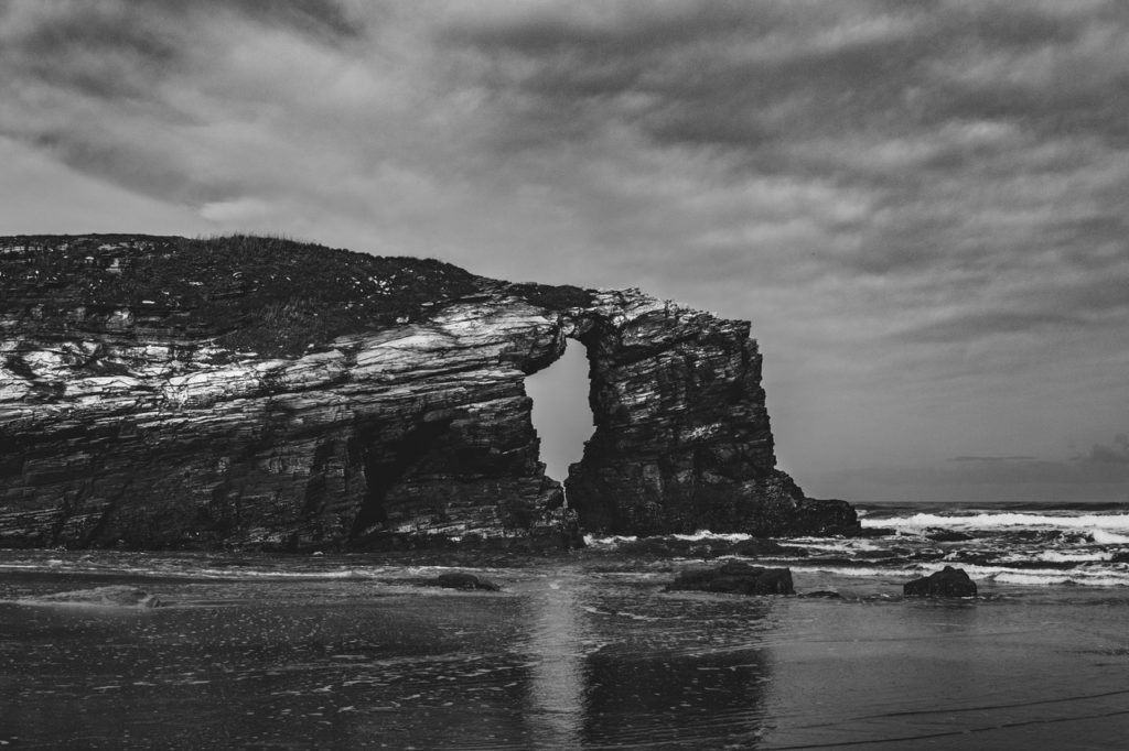 rock formation near body of water