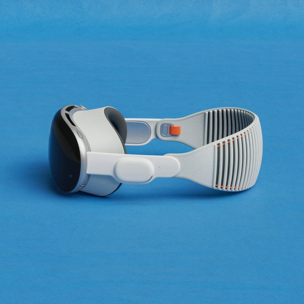 a pair of google glasses on a blue surface