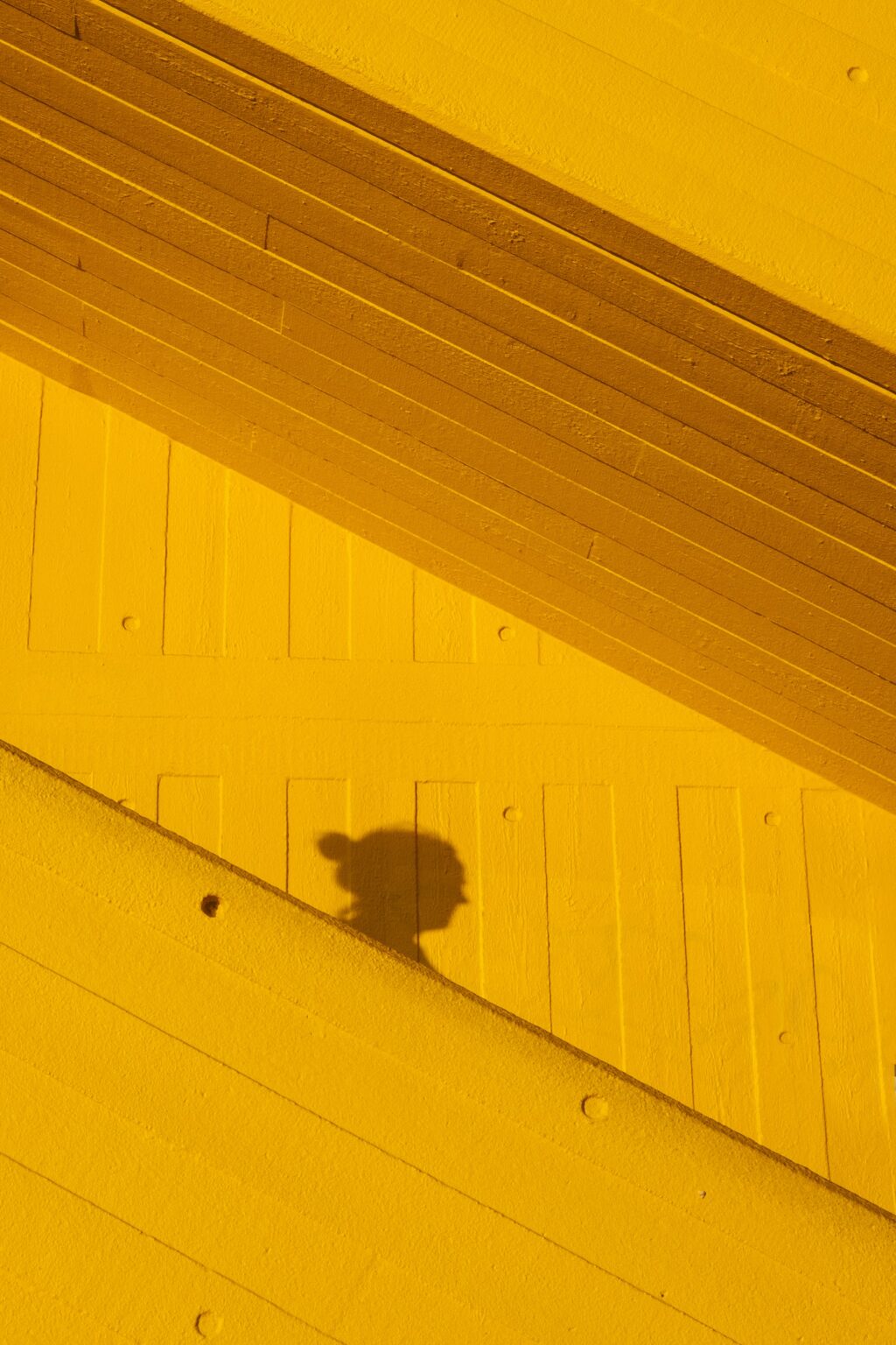 shadow yellow wall